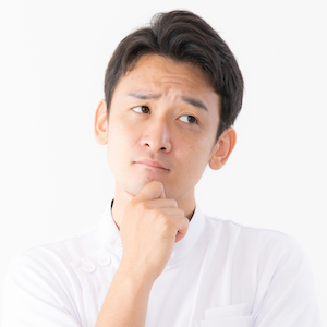 悩むビジネスマン